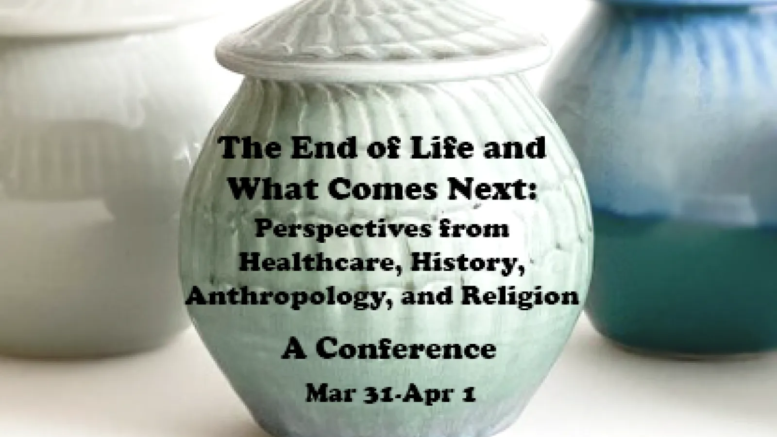 An urn with the conference title and dates