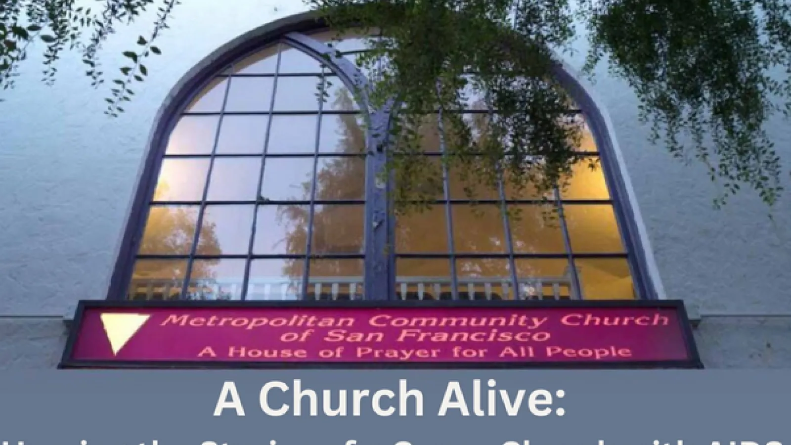 Church window with purple sign below 